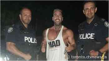 Toronto cops under investigation after being pictured with anti-mask advocate