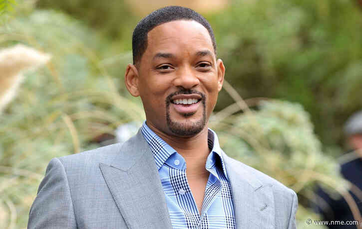 Will Smith conquers his fear of the ocean by swimming with sharks