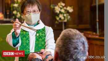 Vicar uses chopsticks in Holy Communion safety measure