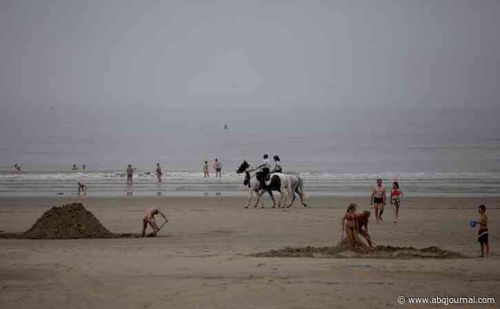 Belgian beach brawl fuels virus, political, climate tension