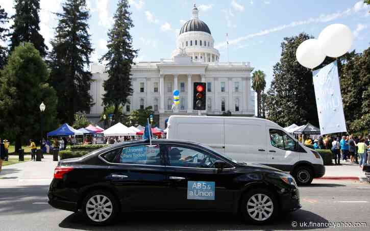 Uber says it will suspend service in California if it is forced to treat drivers as employees