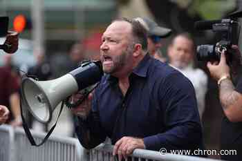 'Free Austin': Conspiracy theorist Alex Jones captured on video shouting at park employees