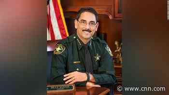 Sheriff bans masks for office visitors on day his county saw most Covid-19 deaths