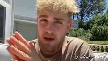 Jake Paul Claims FBI Raid Tied to AZ Looting Case, Chills with Dog and Ex-GF
