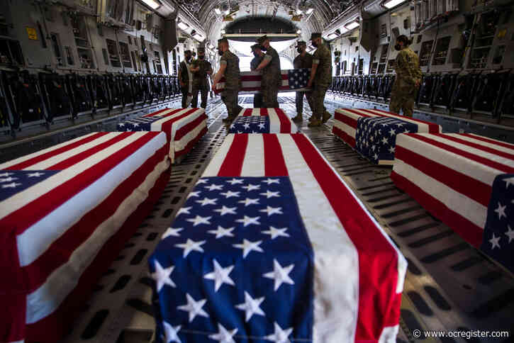 With honor ceremony, 7 Marines and a sailor who died in ocean training exercise are flown to Dover Air Force Base