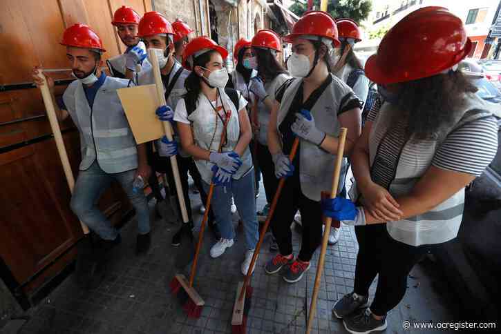 Abandoned by state after explosion, Lebanese help each other
