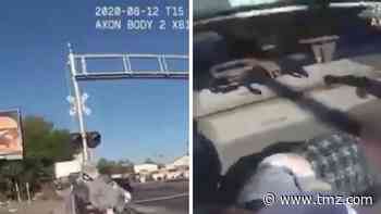 Cop Saves Man Stuck on Train Tracks in Wheelchair with Seconds to Spare