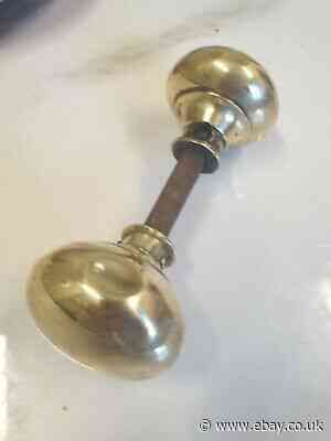 antique pair of brass door knob handles