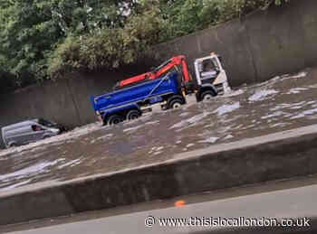 South London hit by 'biblical rain' and flooding on M25