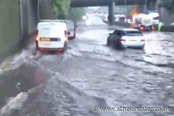 Vehicles stranded on M25 amid flash flooding - St Helens Star