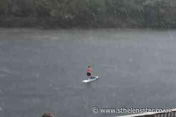 Paddleboarder spotted on the Thames during stormy conditions - St Helens Star