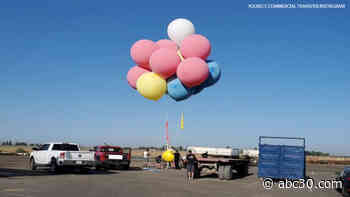 Magician David Blaine soars into Porterville by giant balloon bouquet