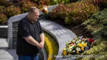 Relatives of Omagh bomb victims lay floral tributes to mark darkest day