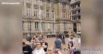 Lockdown protesters shout at people to take off masks