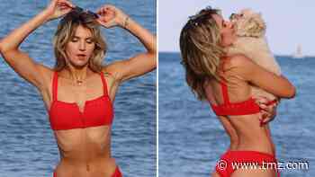 Lexi Mars -- Looking Red-Hot In Pup Pics!