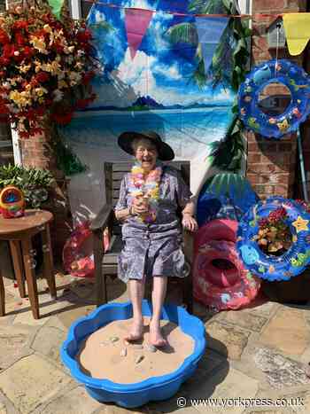 Care home residents enjoy beach party