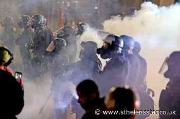 Portland police declare riot as officers push protesters from building - St Helens Star