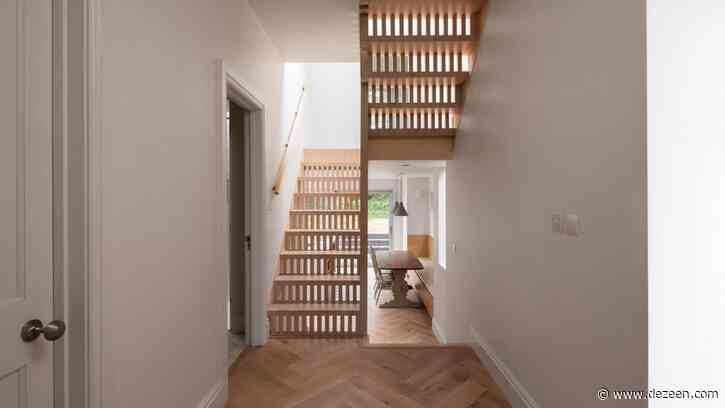 Step House extension built around perforated birch-ply staircase