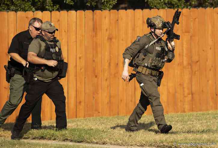 2 released from Texas home amid standoff after officers shot