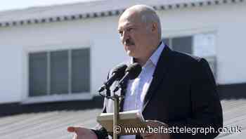 Embattled Belarus leader jeered by workers as strikes grow