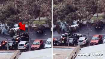 Australian Cop Gets Flung in the Air During Stolen Car Getaway