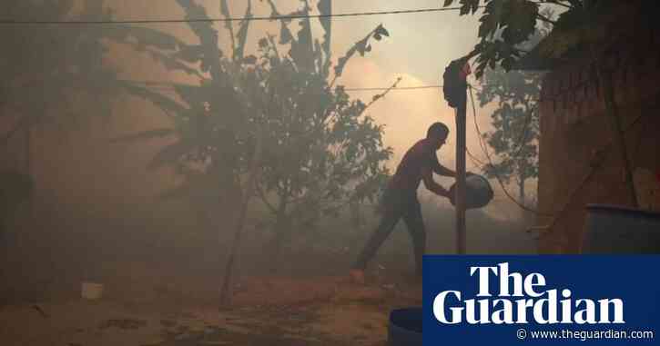 Residents battle Amazon fires in Brazil's Porto Velho – video