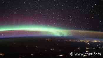 NASA captures haunting view of aurora meeting airglow over Earth     - CNET