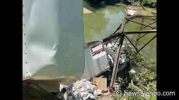 Semi truck splits in half after bridge collapses into a Missouri river, photos show