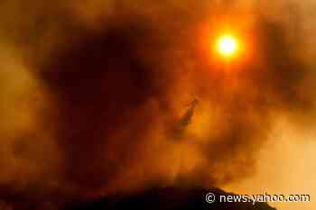 Brutal heat wave continues in the West, exacerbating wildfires and straining California's power grid