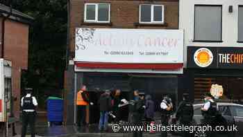 Car crashes into charity shop
