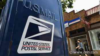 US Postal Service chief halts changes amid uproar and lawsuits
