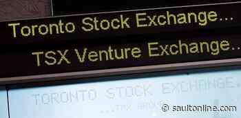 S&P/TSX composite edges lower, loonie tops 76 cents US in early trading