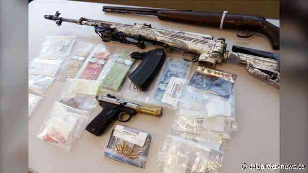Guns and drugs seized, Calgary couple facing charges after ALERT bust
