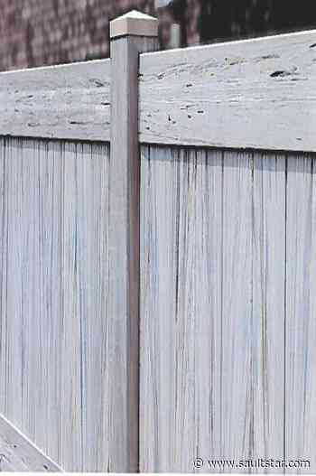 Taller fence still expected for townhouse build