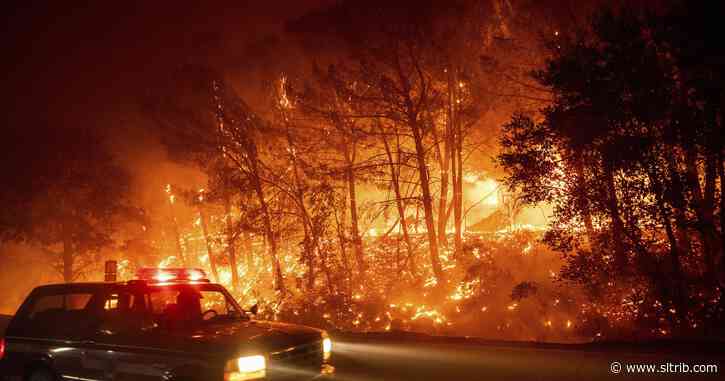 California wildfires chase people from homes into smoky air
