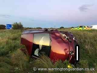 Lucky escape for driver after car ends up in field off M56