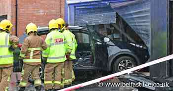 Andersonstown Road crash sees car smash into charity shop - Belfast Live