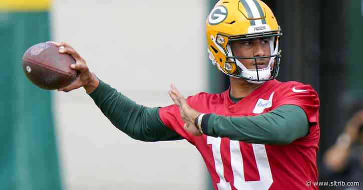 Former Utah State QB Love learning from Packers’ Rodgers