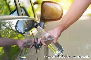 Driver caught with open vodka bottle after lamppost smash