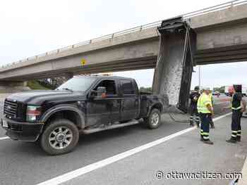 Police say dump truck moving at 100 km/h with dump box elevated before hitting overpass