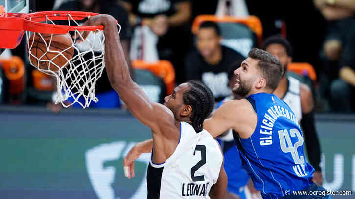 Clippers hold off hobbled Mavericks after Luka Doncic injures ankle