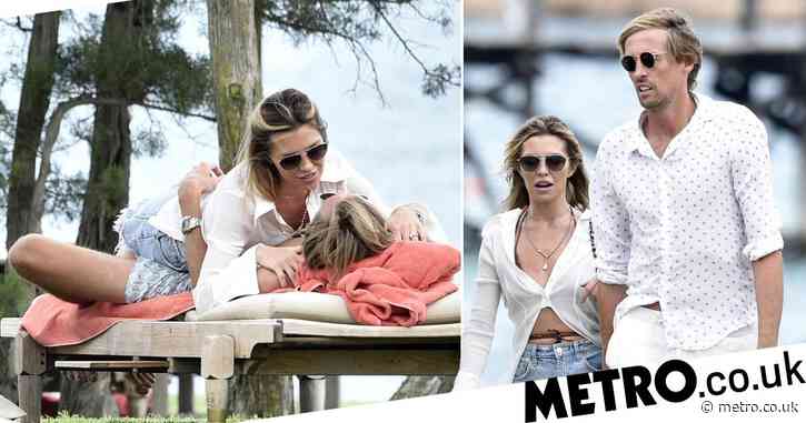 The honeymoon isn’t over for Abbey Clancy and Peter Crouch nine years in as they pack on PDA on holiday