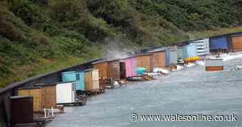 Beach huts washed into the sea by Storm Ellen on Welsh coast