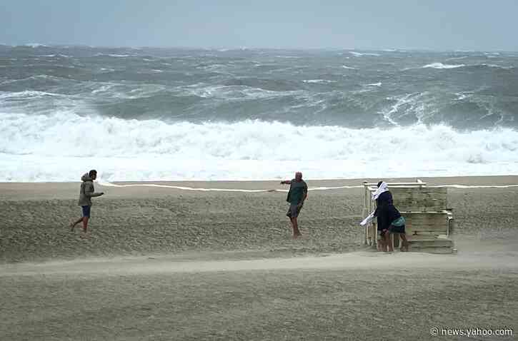 Marco forecast to become hurricane as governors urge residents to brace for storms