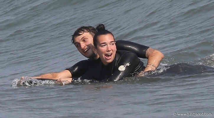 Dua Lipa & Anwar Hadid Keep Close While Boogie Boarding in Malibu!
