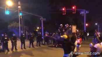 Police Use Flash-Bang Explosives Against Protesters Over Gas Station Shooting