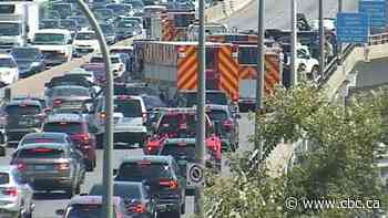 Infant rescued from overturned vehicle, as crash snarls traffic on Gardiner