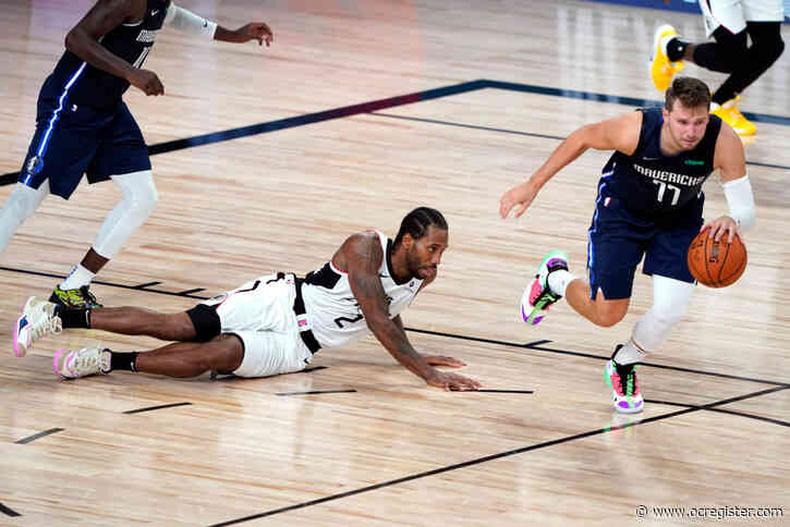 Game 4 photos: Luka Doncic, Mavs shock Clippers in overtime