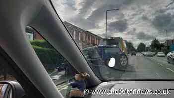 Woman dies and man injured after car collides with pedestrians in Bolton