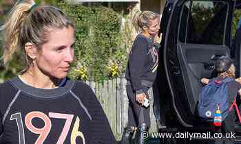 Chris Hemsworth's wife Elsa Pataky looks stressed as she visits a petrol station with her kids - Daily Mail